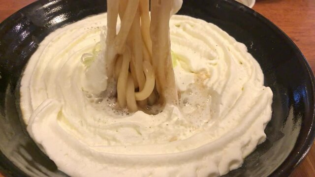 curry udon ramen with mash pototo on top
