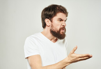 Aggressive man gestures with his hands thick beard irritability stress