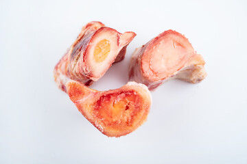 Freshly cut yak bone on white background