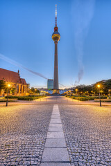 Fototapeta na wymiar The Alexanderplatz in Berlin with the famous Television Tower at dawn