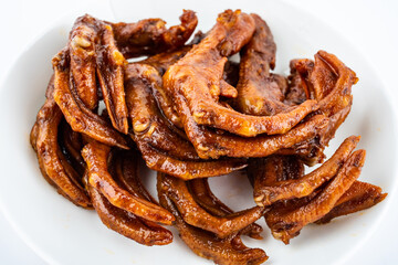 A plate of delicious snack braised duck feet