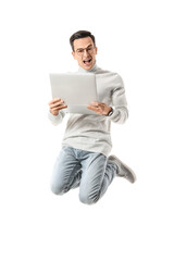 Jumping man with laptop on white background