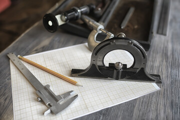 drawing tools, concept engineering project vintage / compass pencil paper education drafting