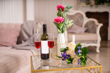 Still life with roses and wine. Morning of bride. Wedding bouquet. 
