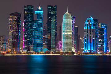 Fototapeta na wymiar Doha skyline reflection at sea at night,Qatar