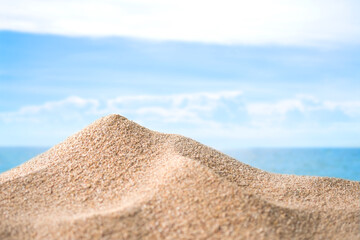 Sand beach with blue sea and blue sky blured at coast. beautiful blue ocean outdoor nature landscape  background. tourist summer travel holidays concept.