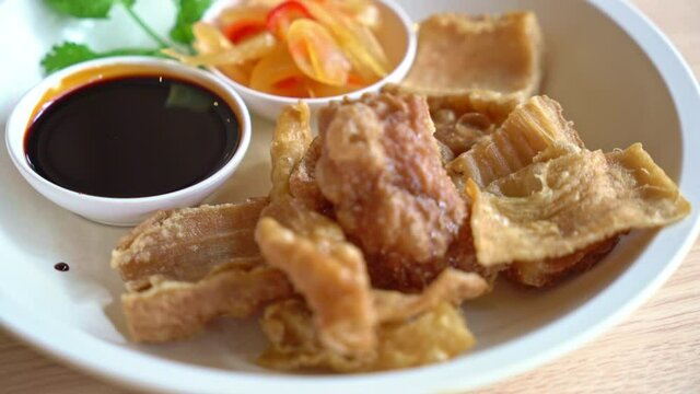 Deep fried pork intestines with sweet black sauce - Asian food style