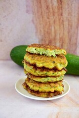 Delicious fried zucchini fritters. Selective focus