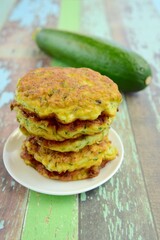 Delicious fried zucchini fritters. Selective focus