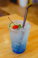 Blue Cocktail Drink with cherries and lemon