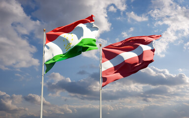 Flags of Tajikistan and Latvia.