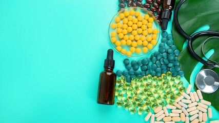 Obraz na płótnie Canvas Alternative herb medicine. Bottles and capsules. Organic natural . Food nutrition healthy and wellness concept.