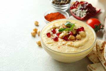 Concept of cooking hummus on white textured background