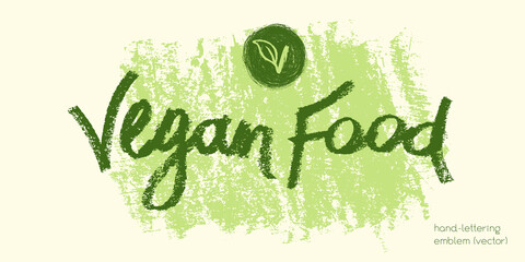 Vector lettering for vegan food icon. Handwritten vegetarian emblem. Chalk texture. Hand drawn vegan label design. Leaf icon. Organic raw food concept. Stamp of vegetarian restaurant, market badge.