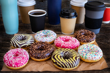 Many colorful donuts on the table
