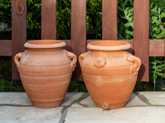 Fototapeta na wymiar decorative clay pot in garden