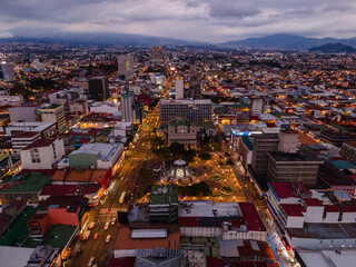 Beautiful aerial view of the City of San Jose Costa Rica, Its park Sabana, buildings at sunset 