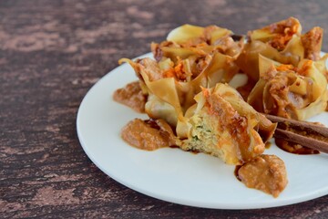 Siomay, Indonesian Food, steamed dumplings with peanut sauce and thick soy sauce or kecap manis