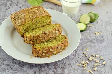 Wheatgrass zucchini bread with sunflower seeds. Served with milk