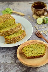 Slices of wheatgrass zucchini bread with sunflower seeds