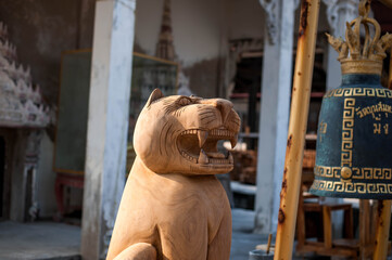 Tiger wood sculpture at Wat Khun Samut Chin temple,Samut Prakan province, Thailand