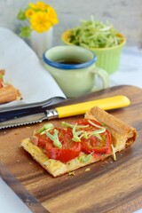 Tomato tart with mung bean sprouts. Selective focus