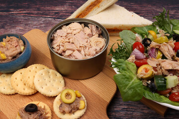 Tin can tuna fish meat chunk flake product recipes salad spread topping tapas cracker sandwich on...