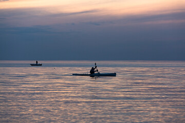 Boat in the sea with dark clouds