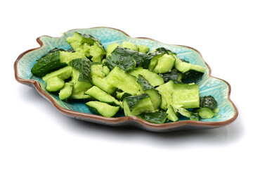 ripe cucumber is broken on white background