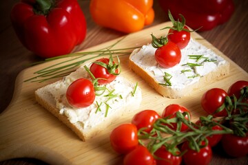 toast bread with tomato and pepper spread and chives