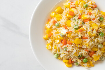 fried rice with mixed vegetable (carrot, green bean peas, corn) and egg