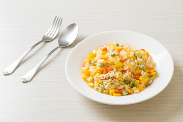 fried rice with mixed vegetable (carrot, green bean peas, corn) and egg