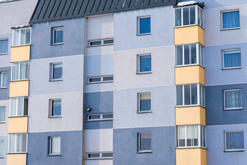 Fragment residential apartment with flat building exterior. Detail of New luxury house and home complex.