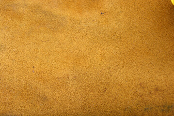 Brown background made of genuine leather, natural suede. 