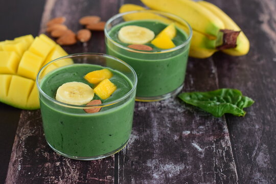 Spirulina Green Smoothie With Banana, Spinach, Mango And Almond Nuts