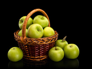 Green apples in wattle basket