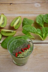 Spirulina green smoothie with goji berry, spinach, chia seed and hemp seed