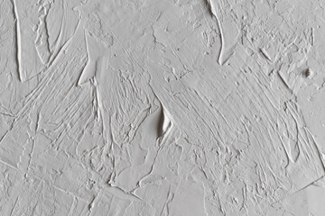 White decorative surface. White plastered textured wall