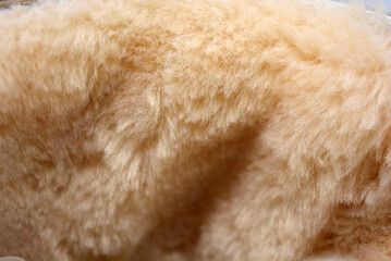 White light fur with wide fiber. Dense synthetic material. Warm, warming materials for winter...