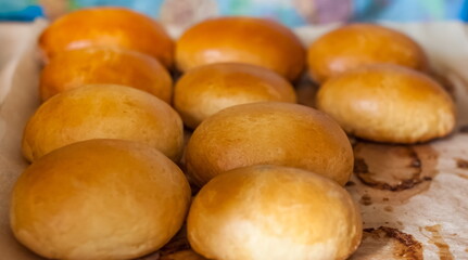Baked pies stuffed with cabbage with mushrooms closeup