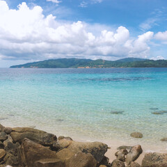 Fototapeta premium A stunning view, a perfect white sand and crystal clear water at Labuana beach Central Sulawesi Indonesia