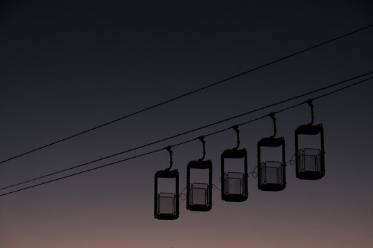 cable car at sunset in ski resort