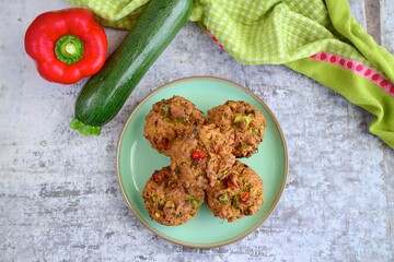 Savory vegan muffins with zucchini and bell pepper