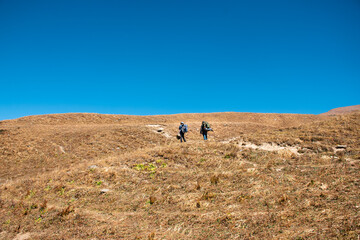 Walking in the mountains with friend in Manali, Himachal Pradesh, India