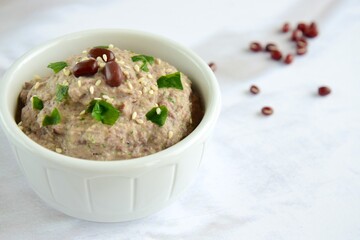 Adzuki bean tahini dip on white background