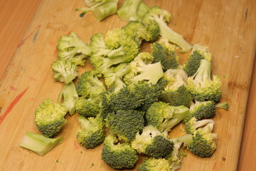 Broccoli into a bowl isolated in wood background