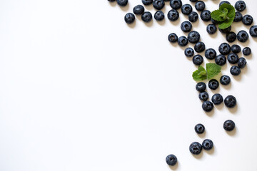 Fresh juicy blueberries background. Flat lay top view copy space. Healthy berry, organic food, antioxidant, vitamin, blue food