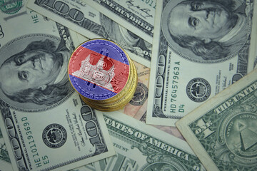 golden shining bitcoins with flag of cambodia on a dollar money background.