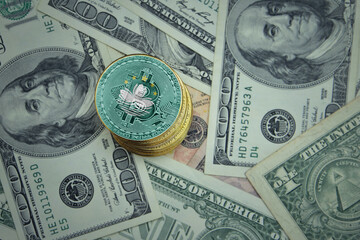 golden shining bitcoins with flag of Macau on a dollar money background.