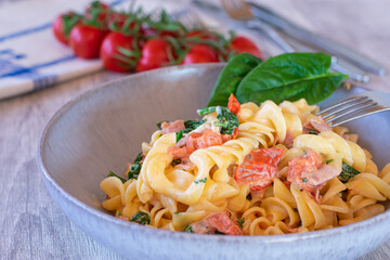 greek Pasta with melted  feta cheese, cherry tomatoes and spinach